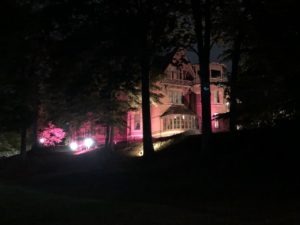 House in Dark Behind Trees