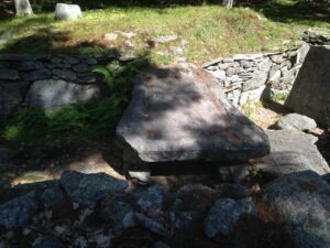 Large stone slab with grooves