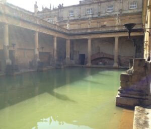 Large rectangular pool with surrounding by classical building