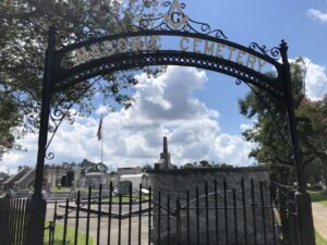 Masonic Cemetery gate with tombs behind