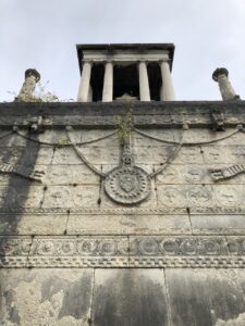 Back of the mausoleum showing the base and carvings