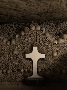 Cross surrounded by bones