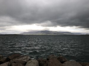 Mountain in distance with water