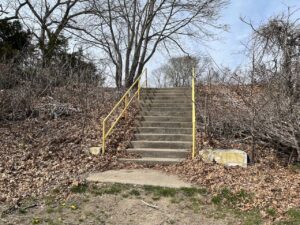 Stairs with yellow railings